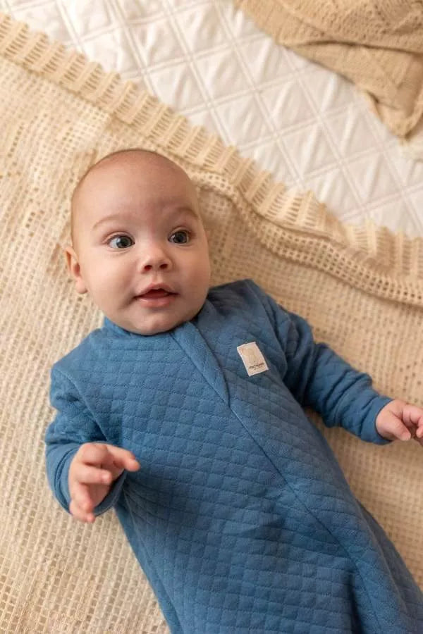 Prošívaný bavlněný overal – džínově modrý (0–12 měsíců)